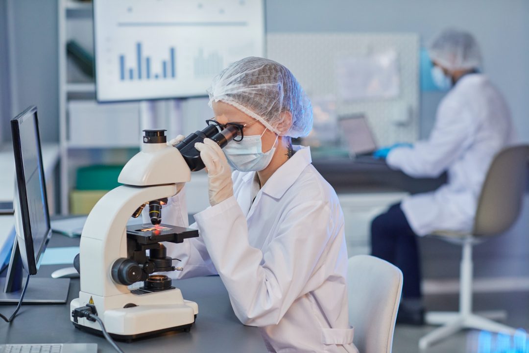 woman-holding-research-at-the-laboratory